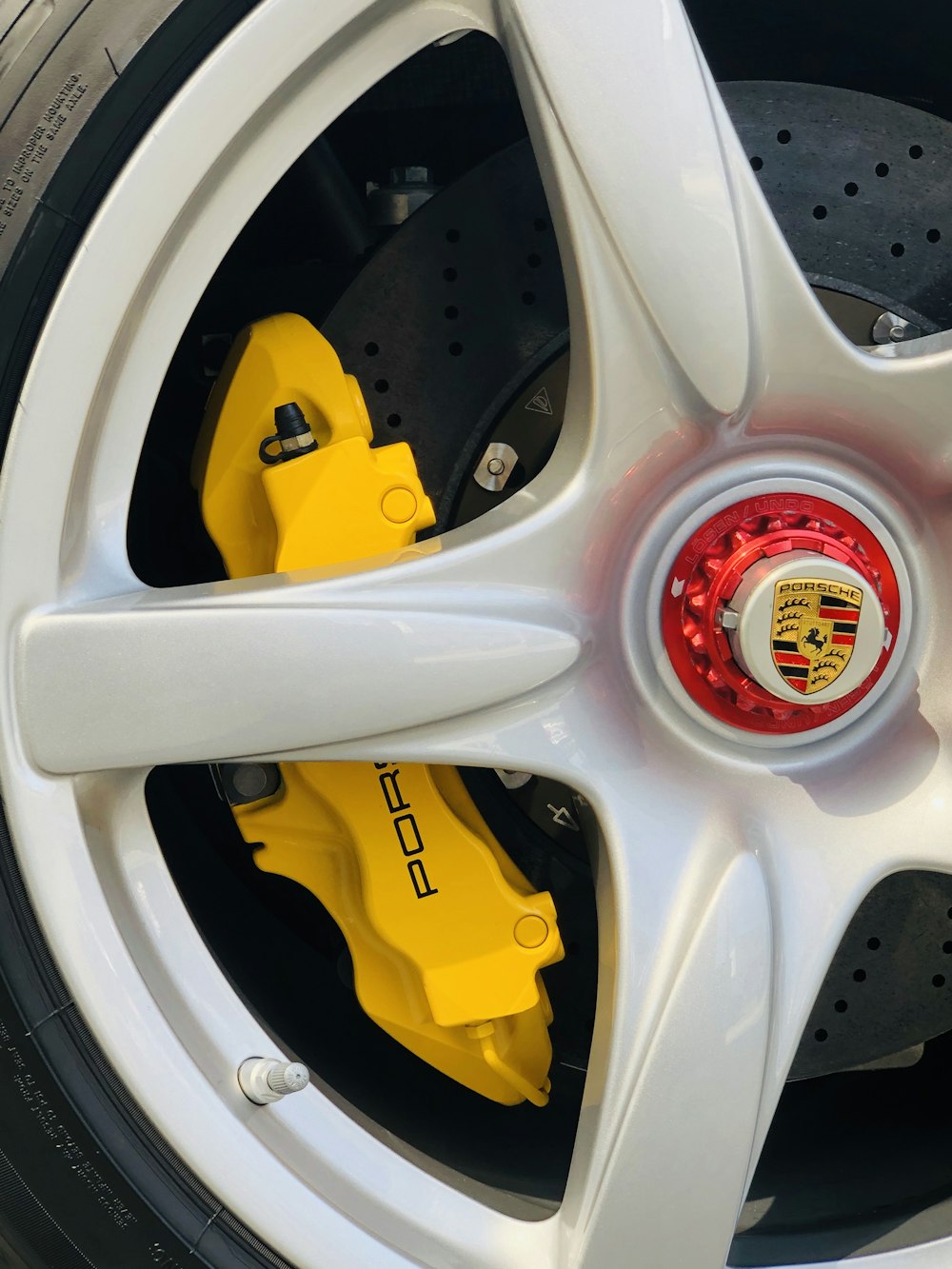 white Porsche vehicle wheel