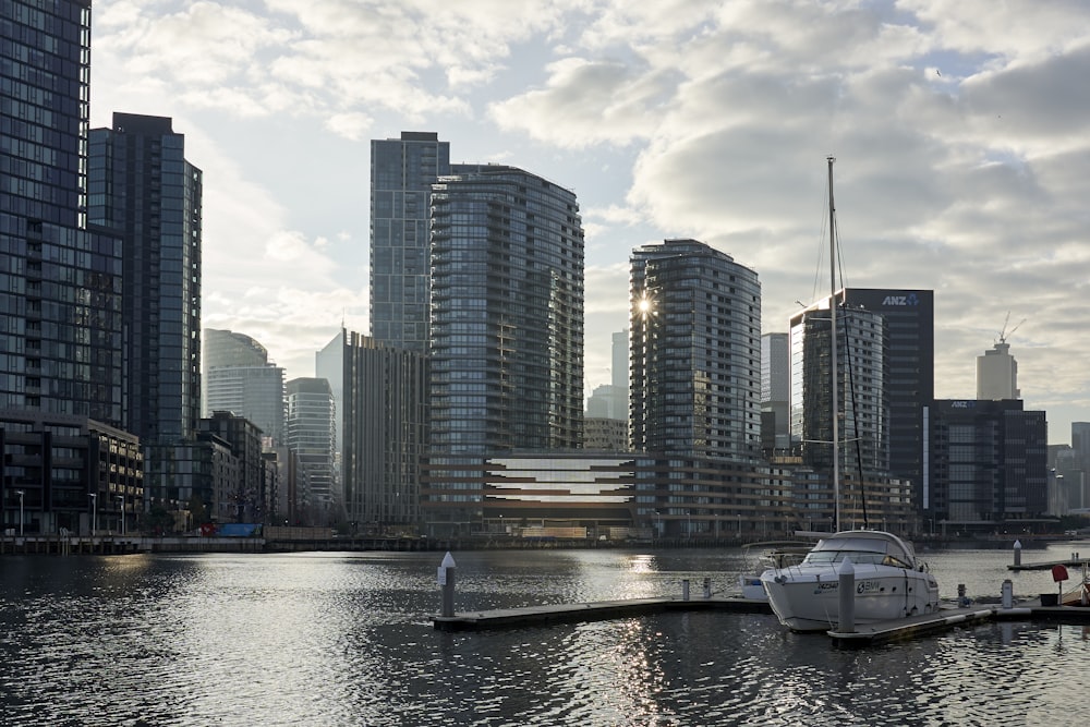 calm sea beside concrete buildings