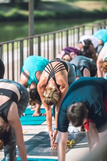 A group of people participating in a yoga class.