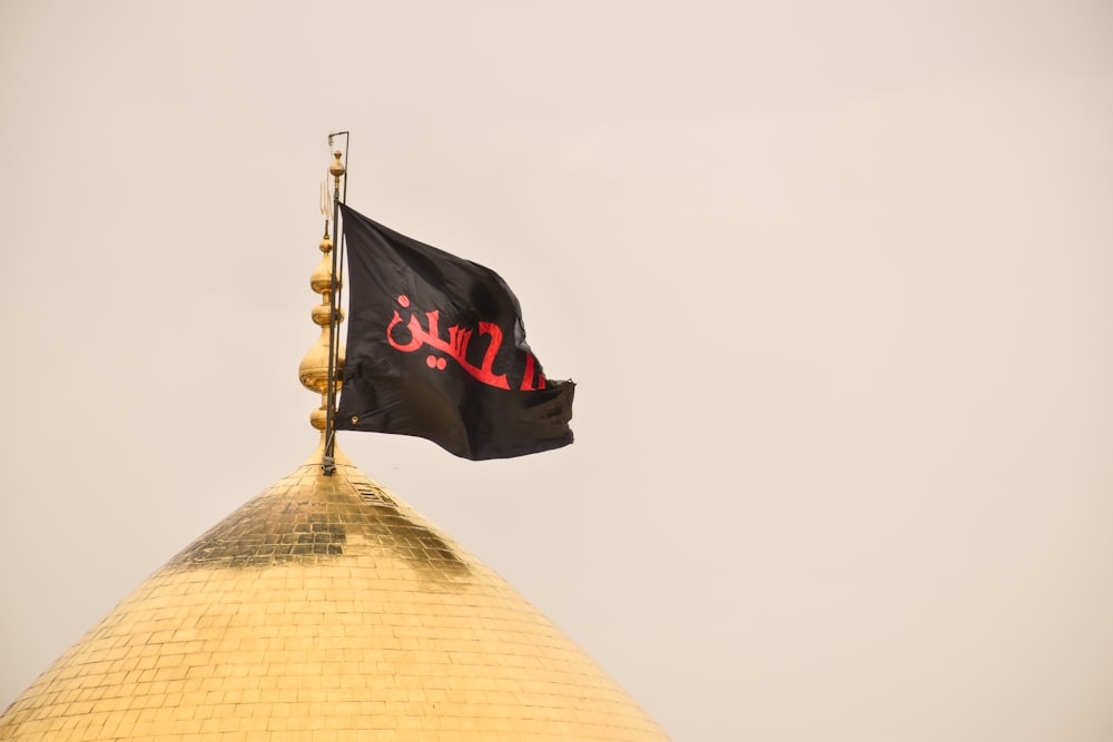 black flag on pyramid building