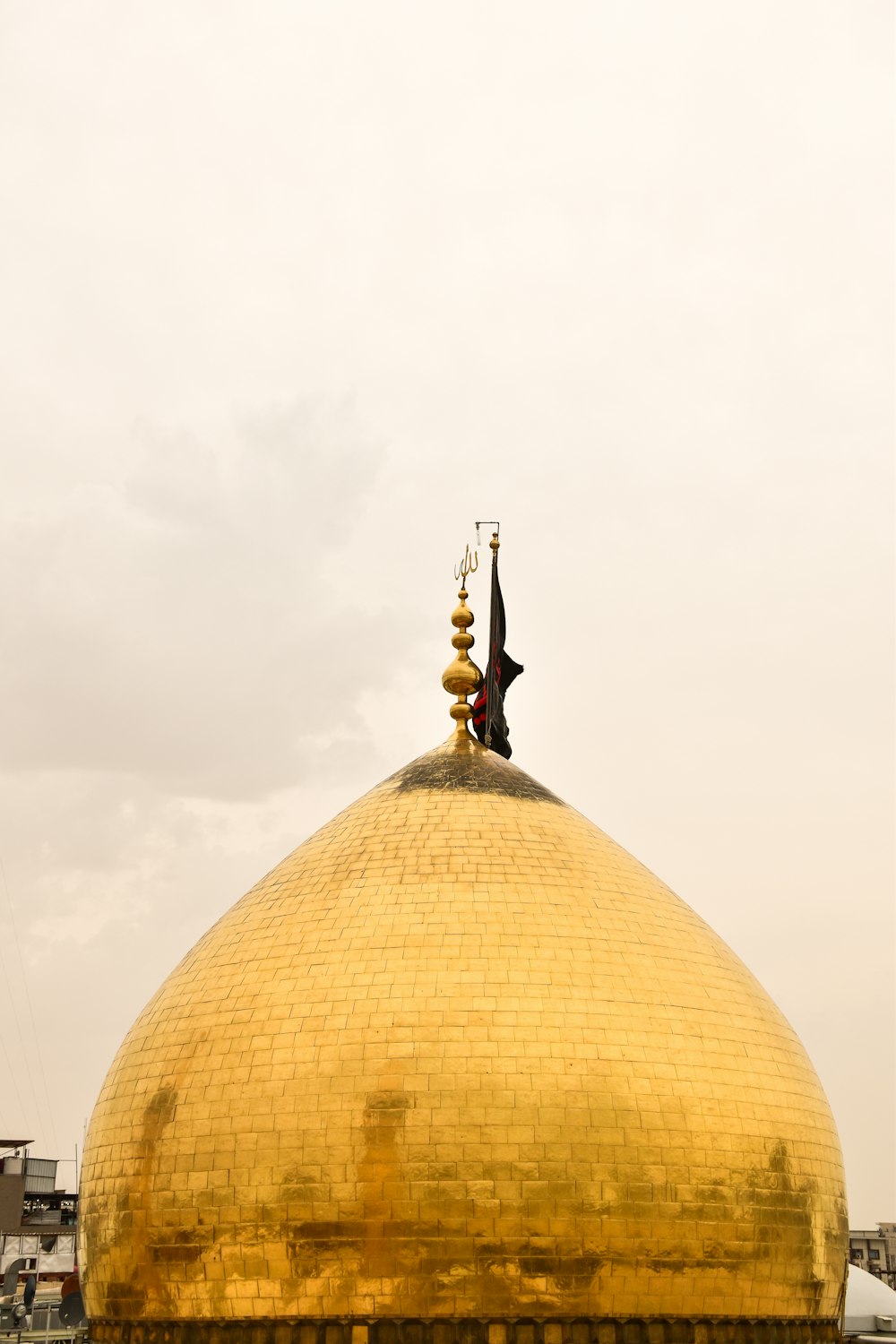 gold-colored dome building