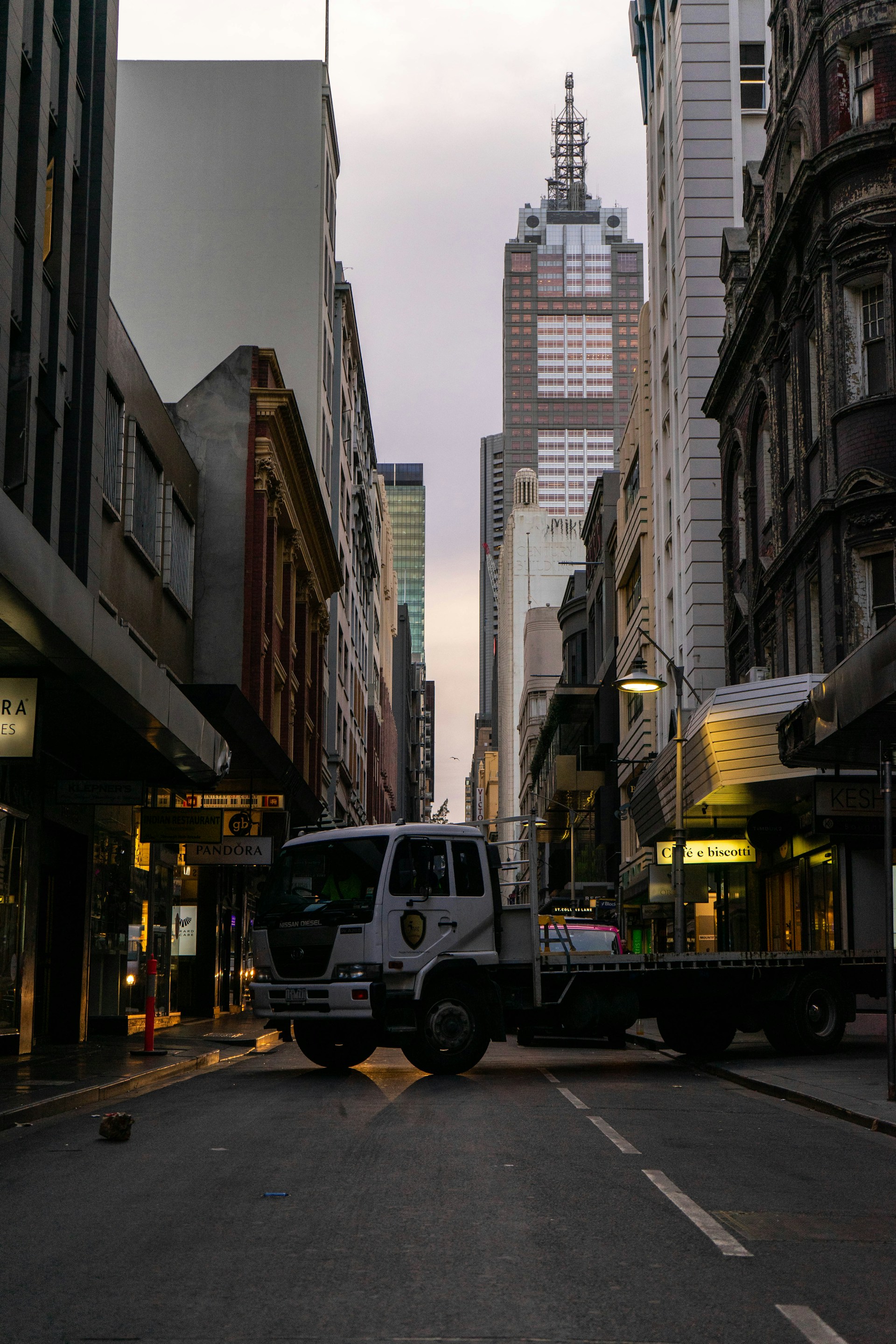 black and brown leather padded tub sofa