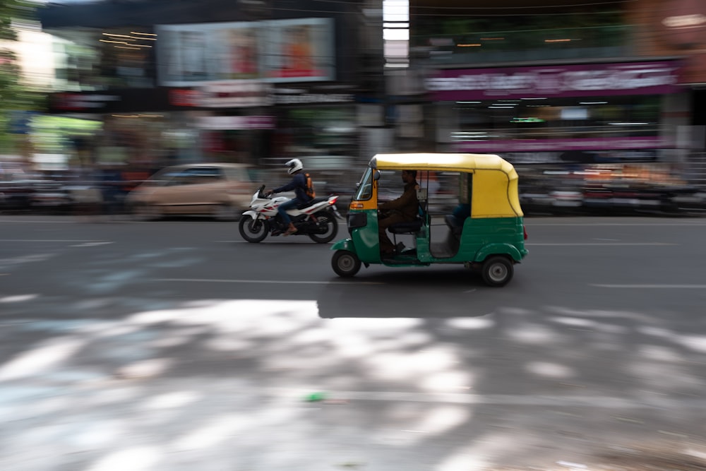 yellow auto-rickshaw