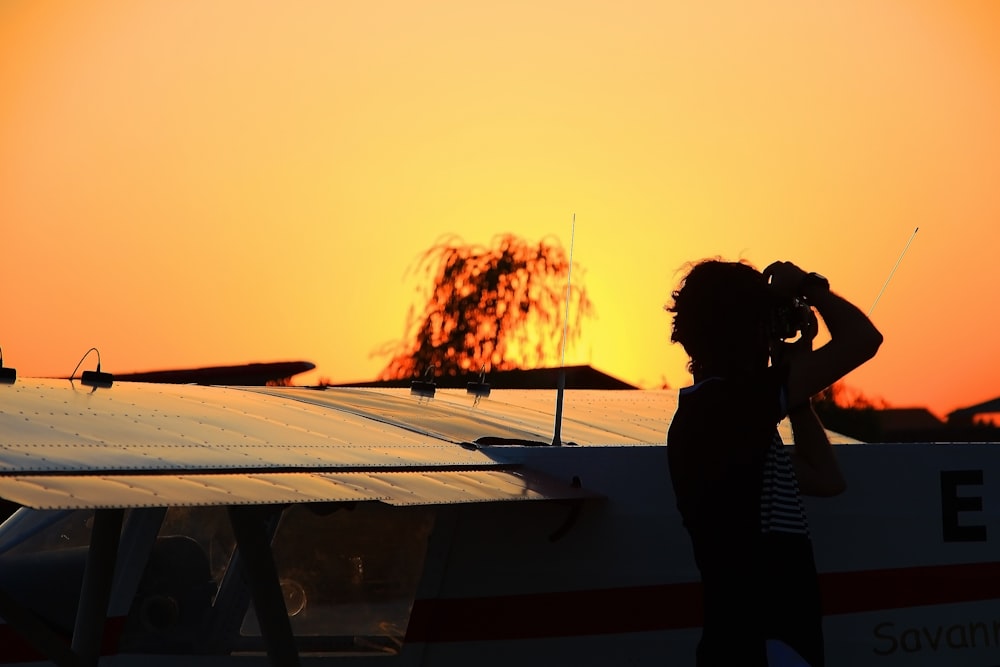 silhouette of person taking photo