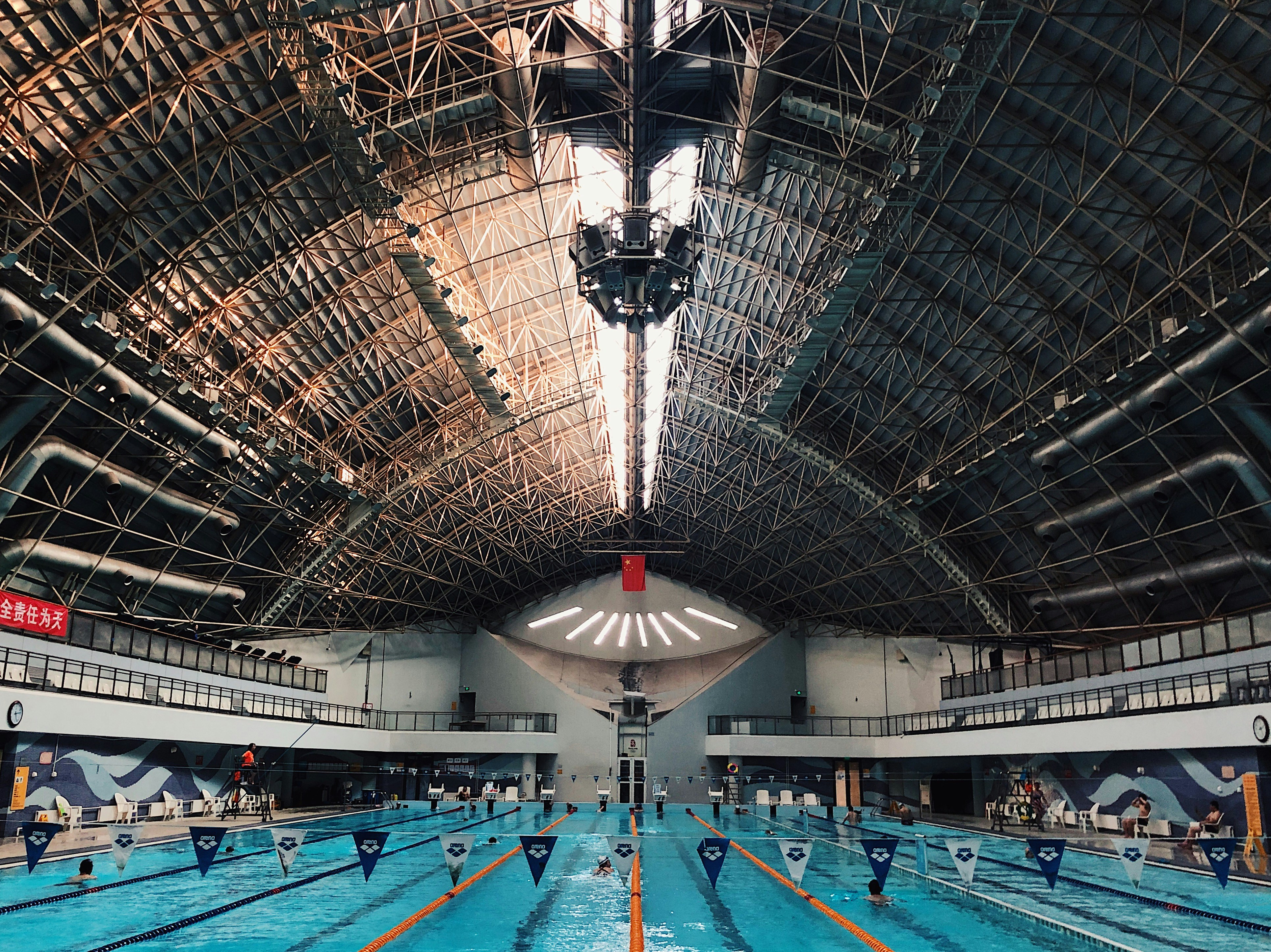 A large indoor swimming pool with no people photo – Free Human Image on ...