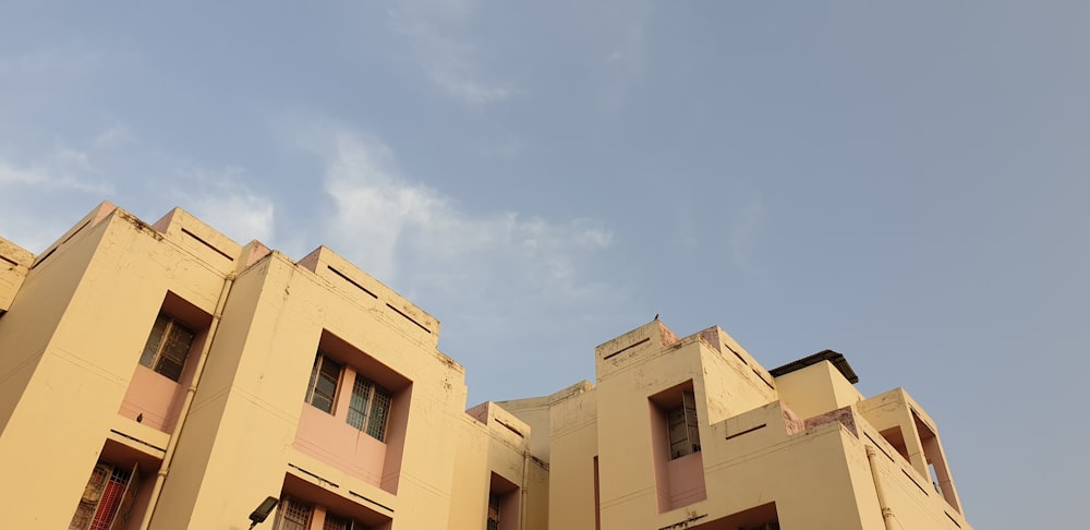 white concrete building under blue sky