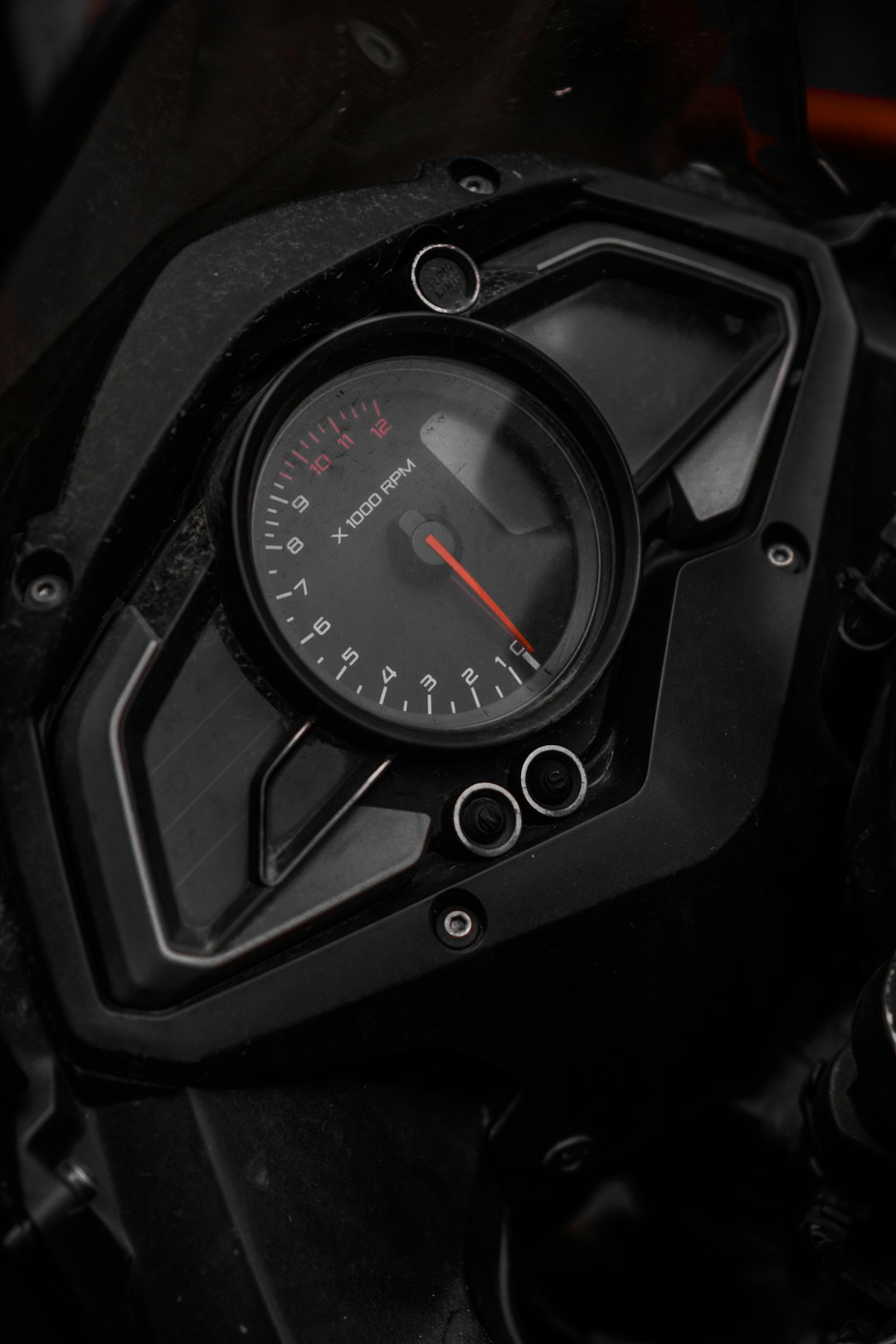 black speedometer displaying 0