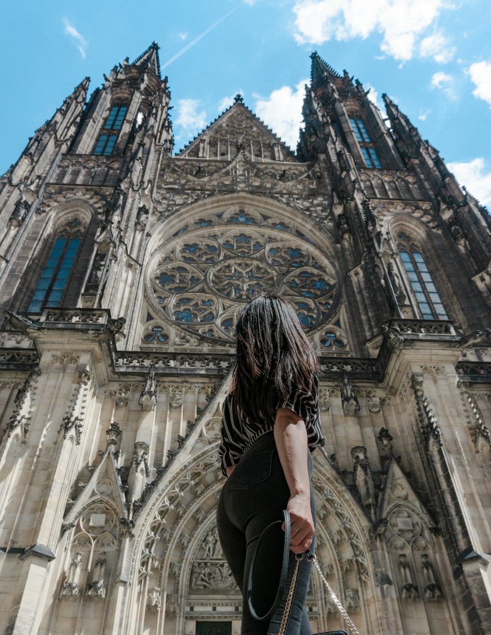 woman standing in front of church