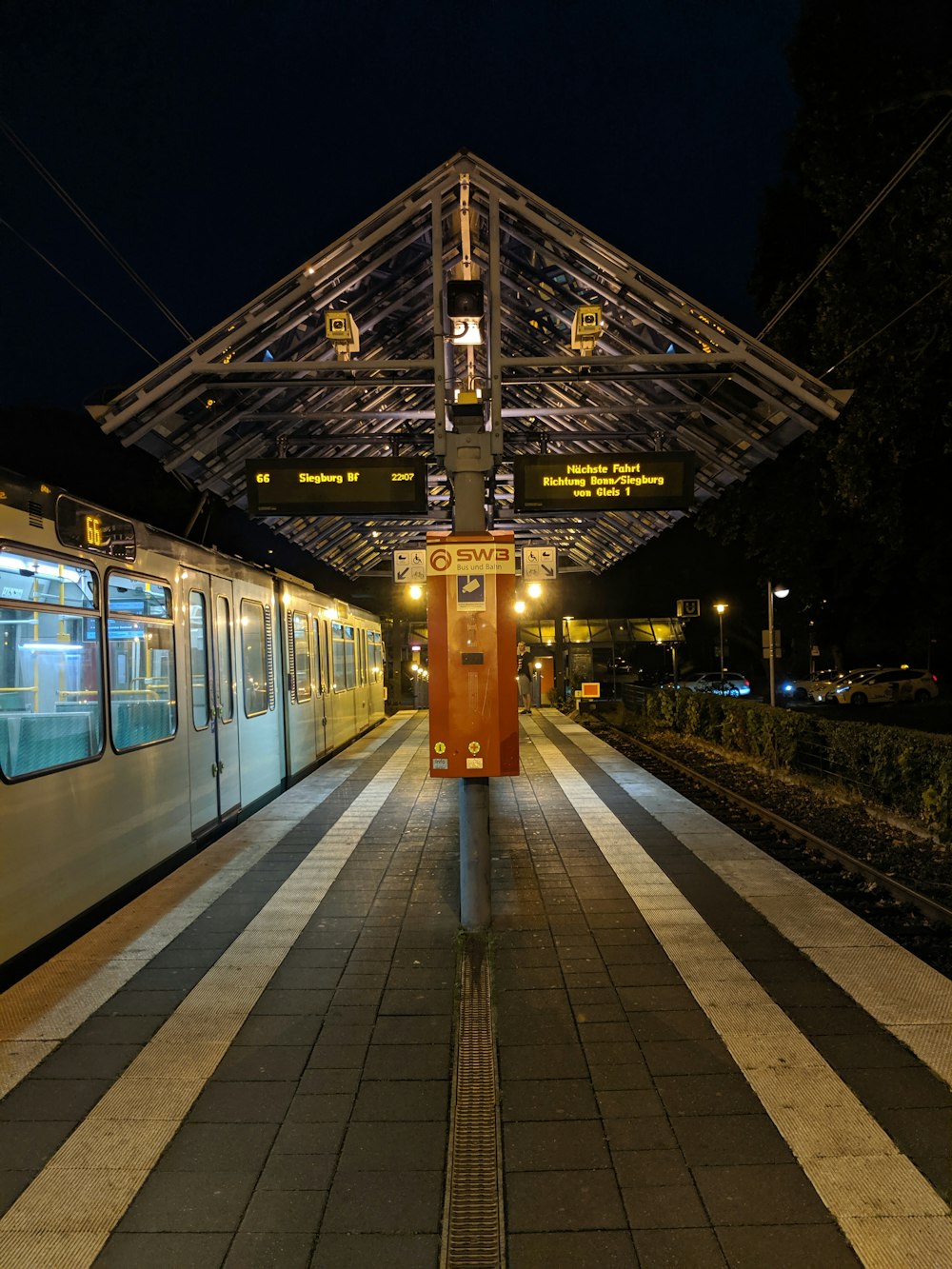 empty shed beside train