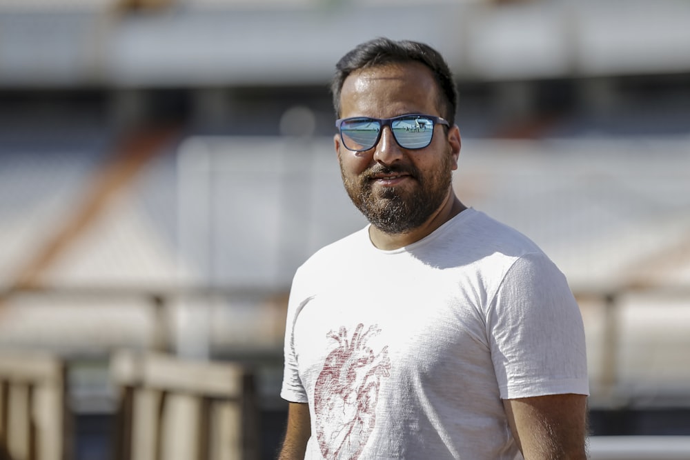 man wearing blue sunglasses