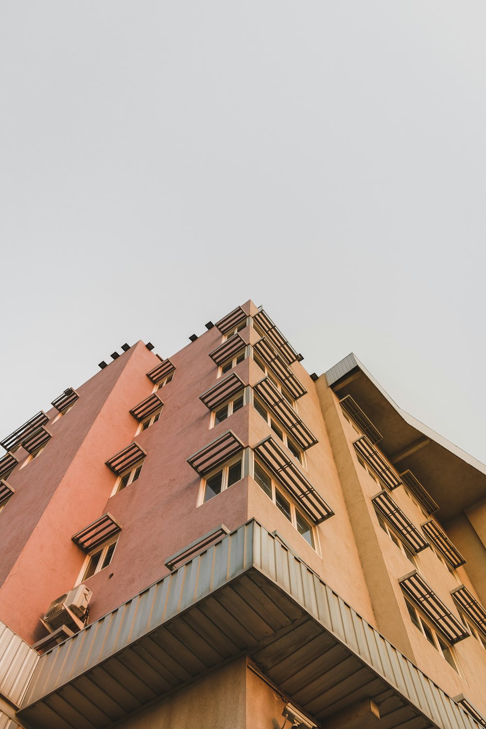 low angle photo of brown building