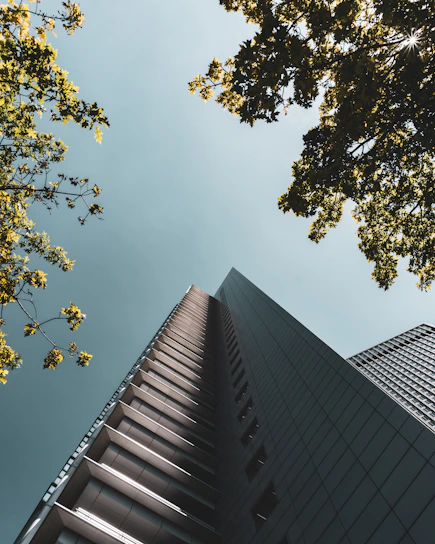 looking up at a tall building from below