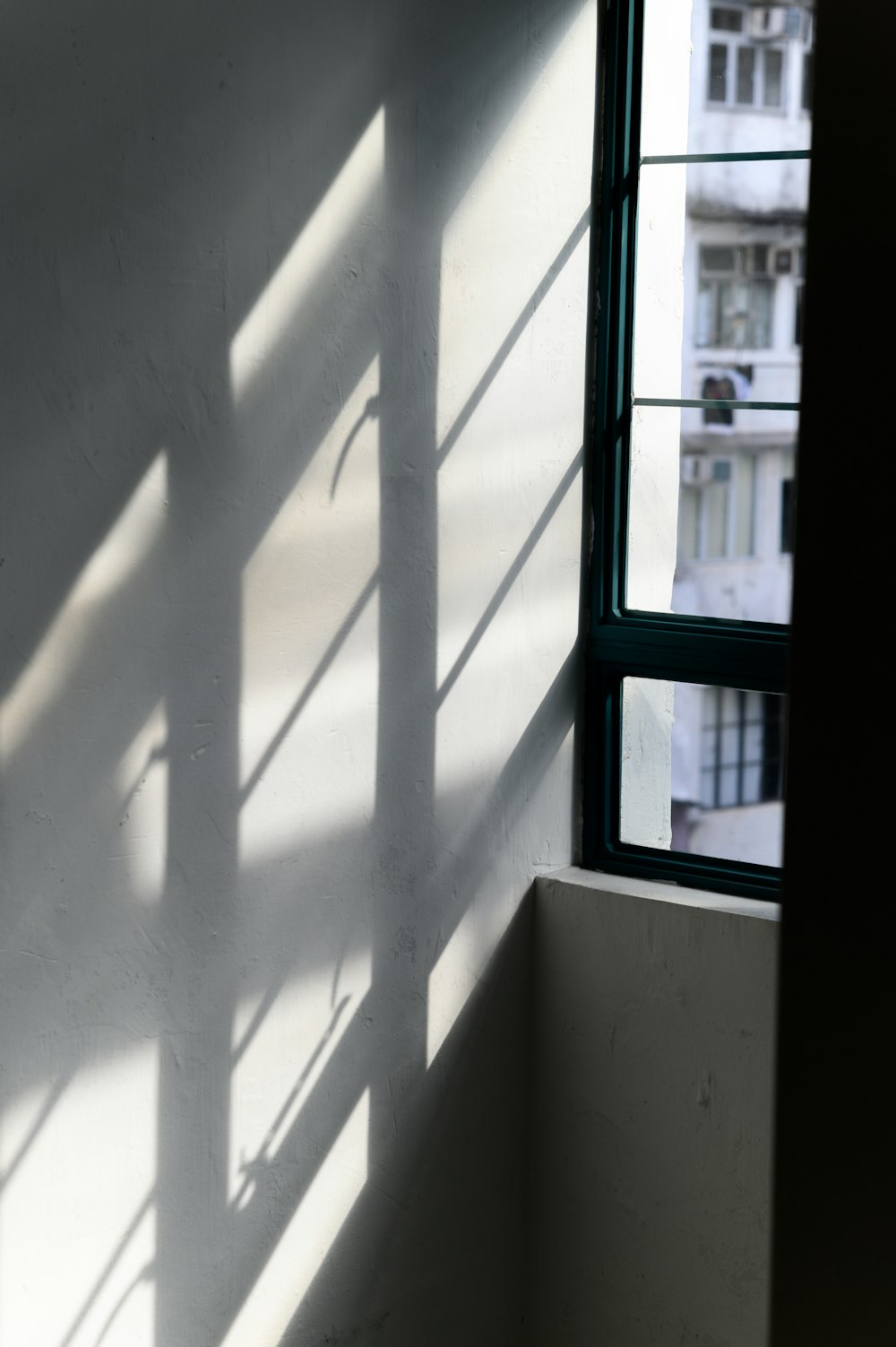 apartment corridor wall with window shadow