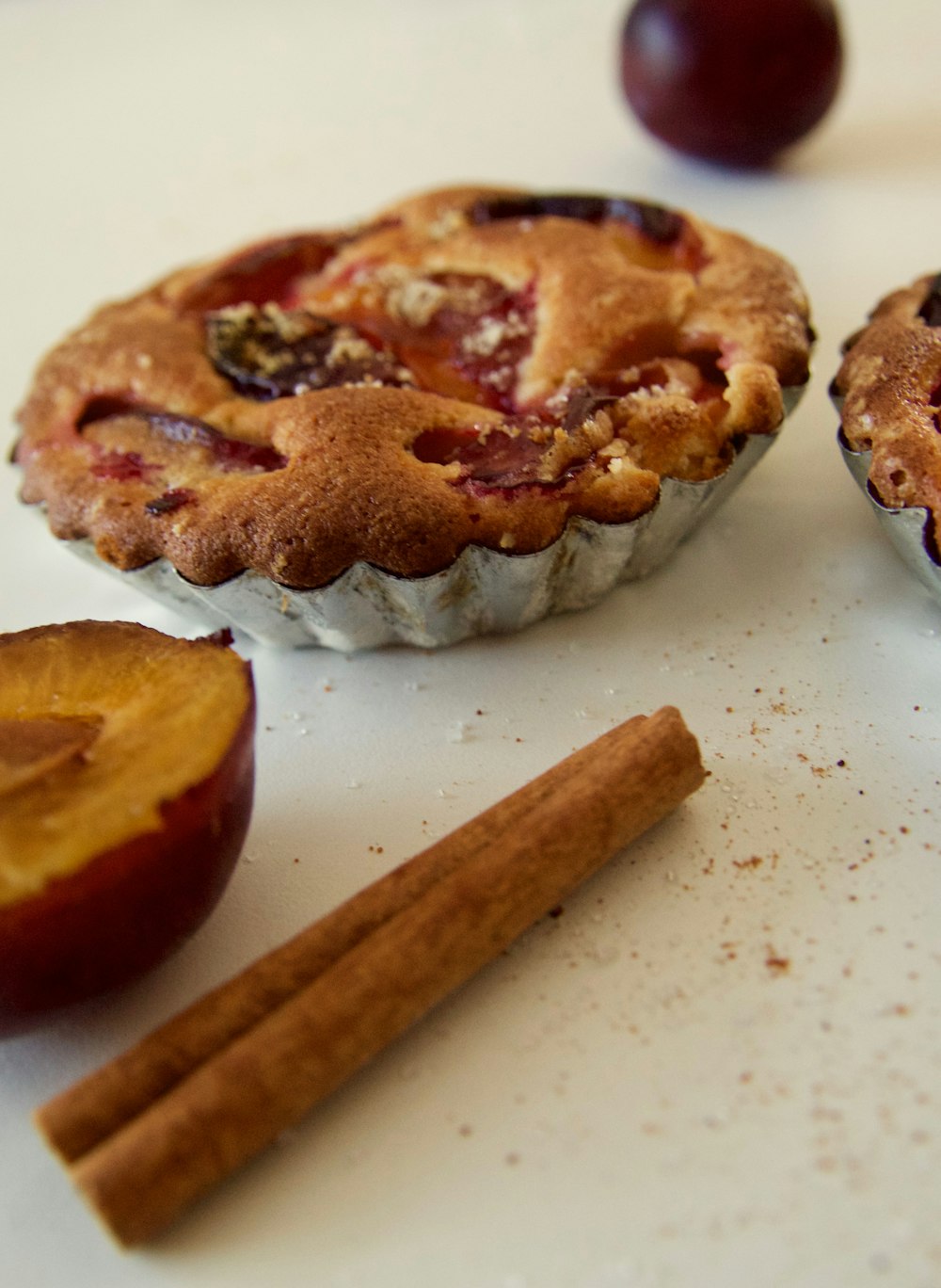 muffins on trays on white surface