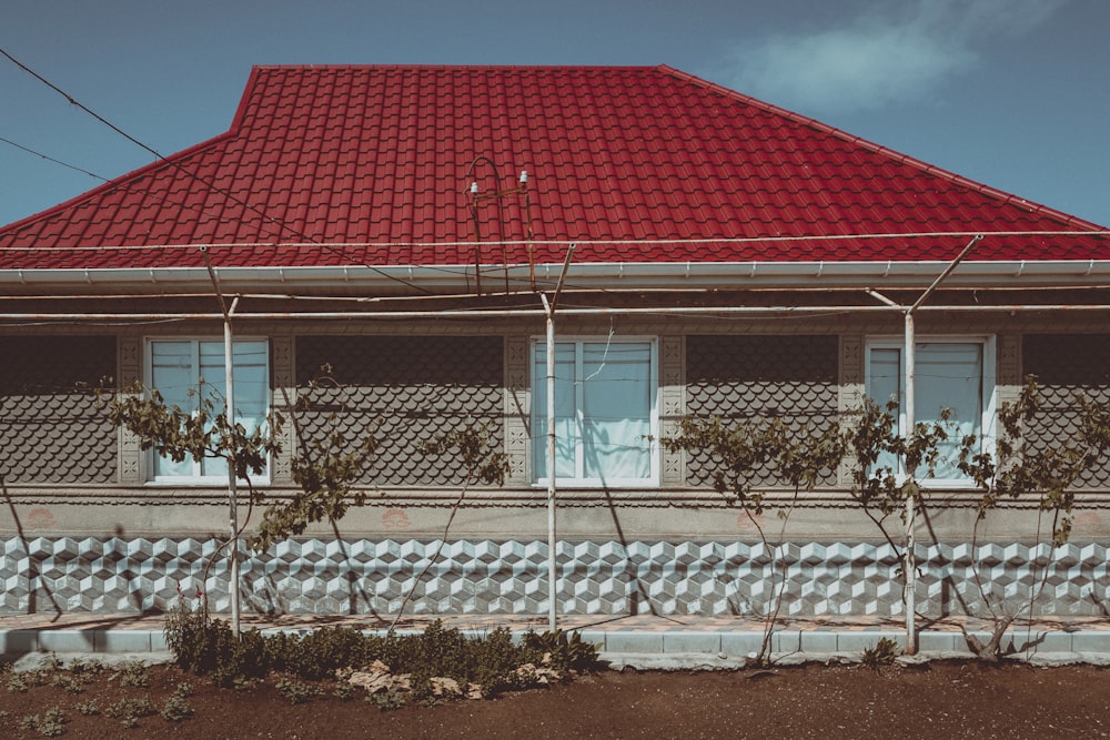 white and red concrete house