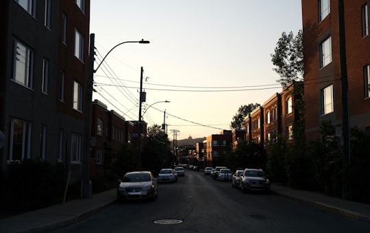 vehicles beside road in Saint-Henri Canada