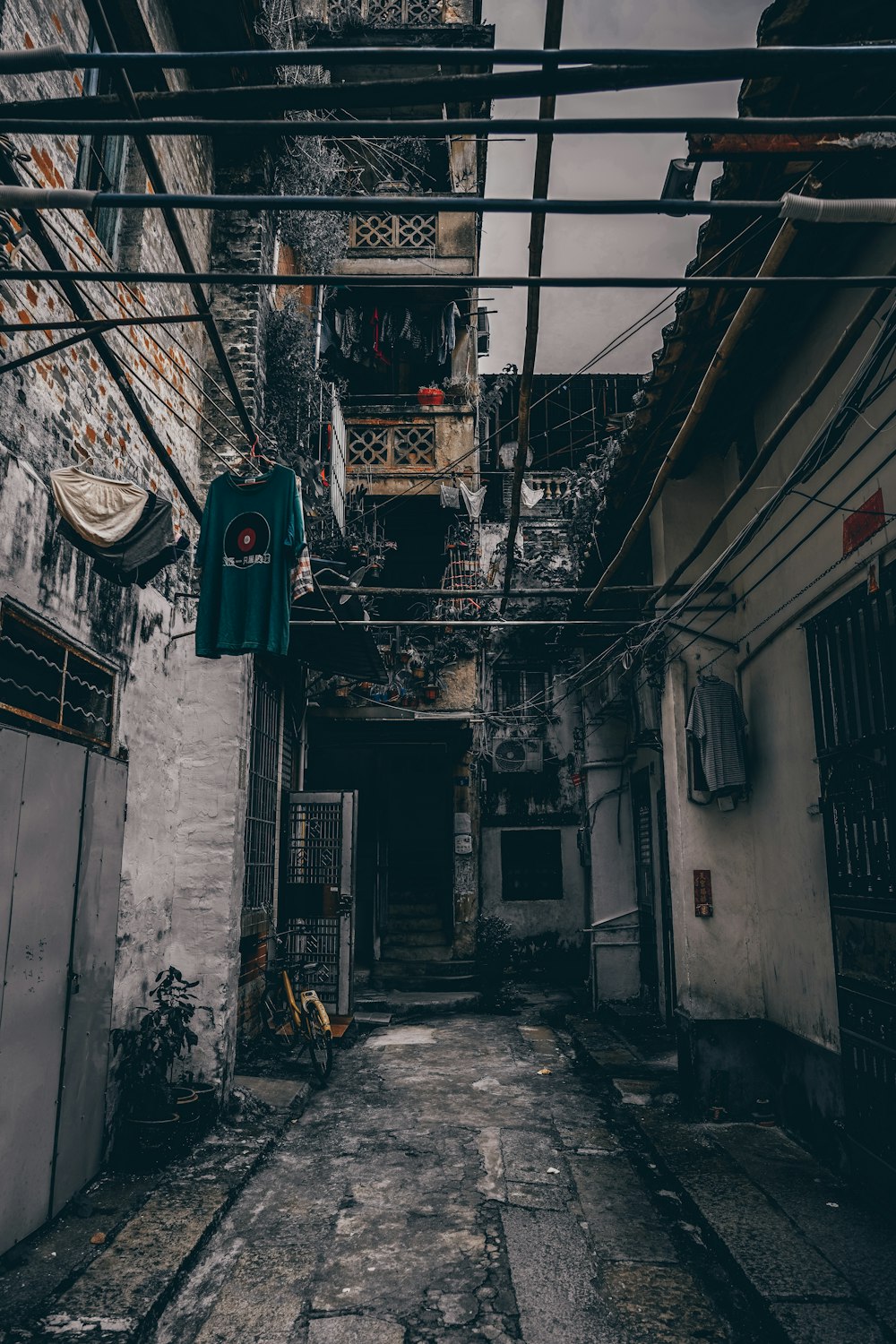 concrete pathway in between houses