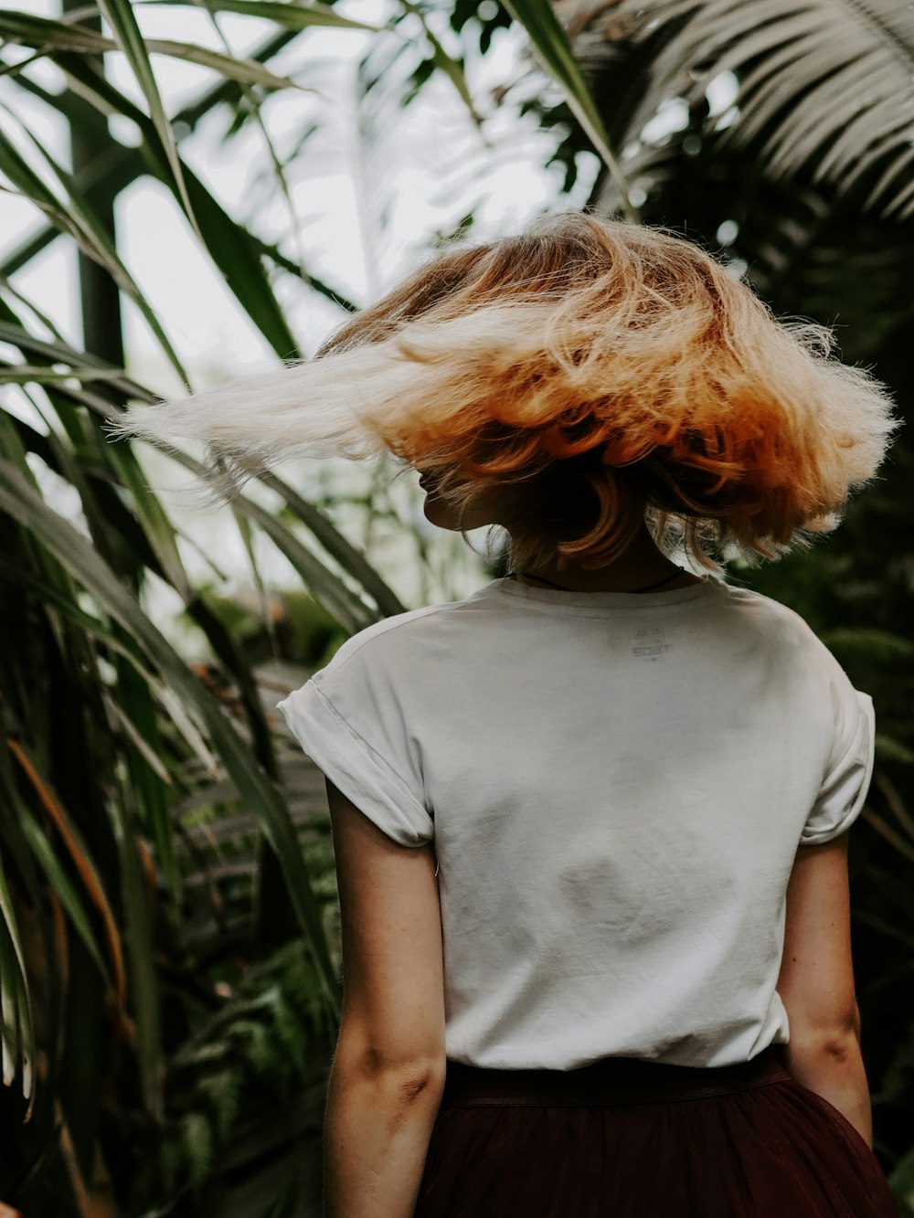 woman wearing white crew-neck shirt