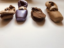 A collage of dancewear and pointe shoes collected during donation drives.