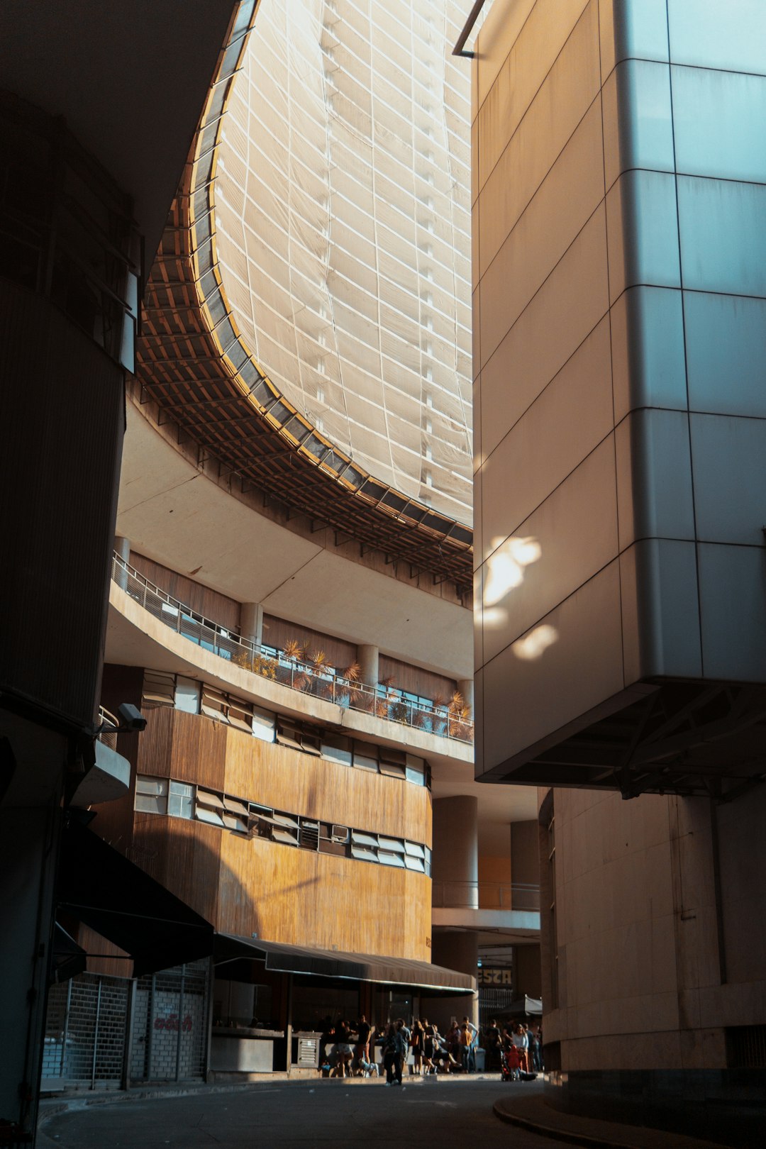 people walking near high-rise building during daytime