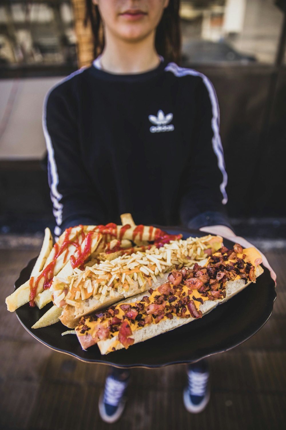 person holding food tray