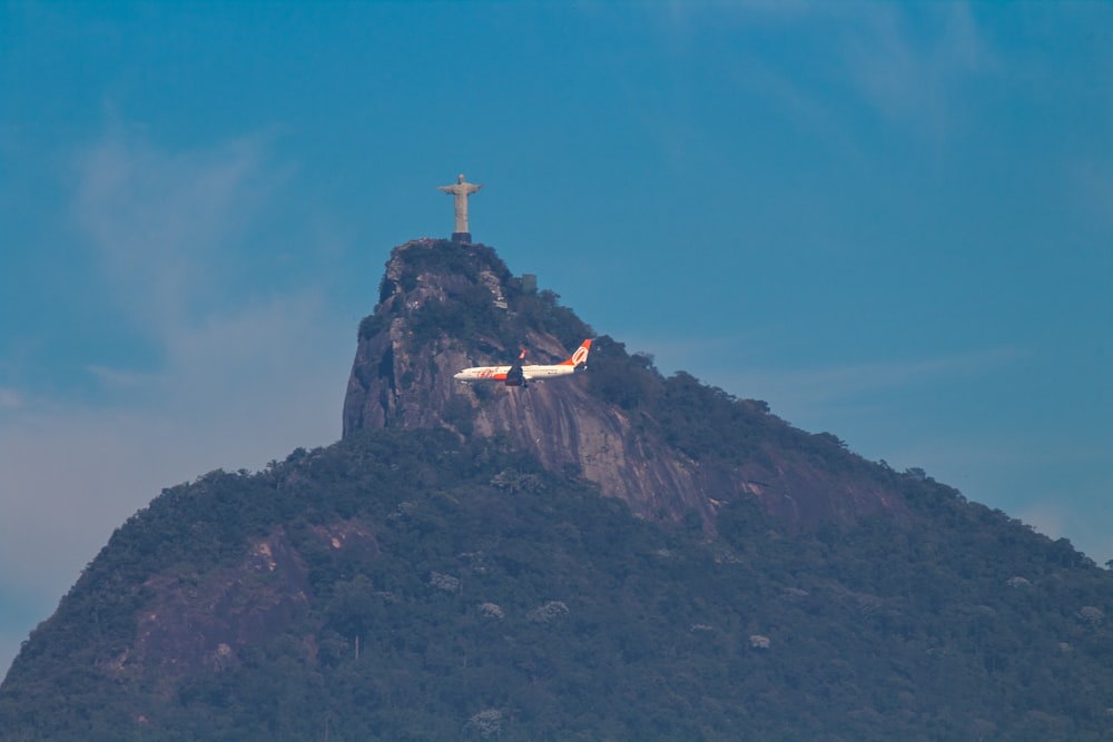 white and orange airliner