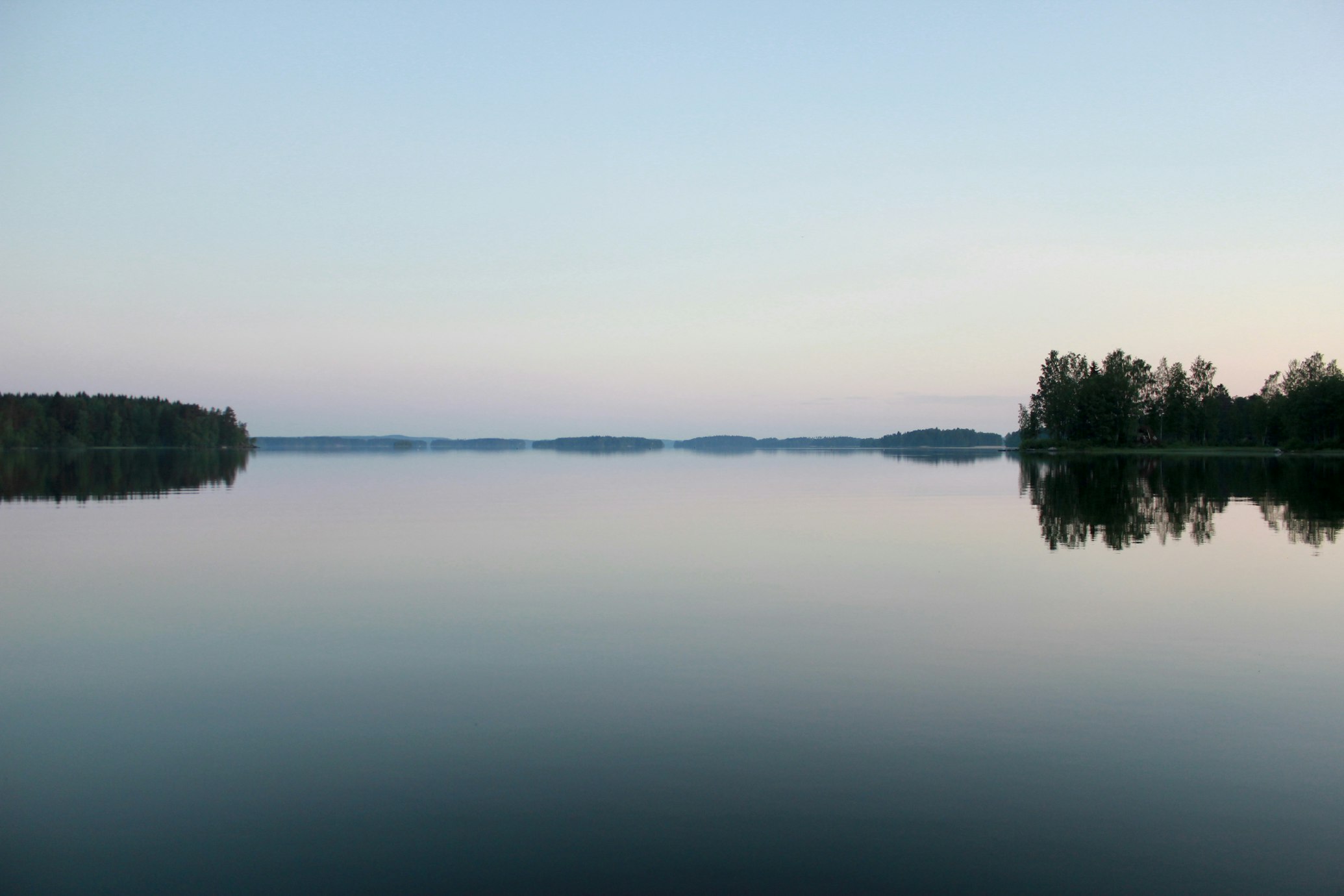 View of Lake under clear sky in Finland