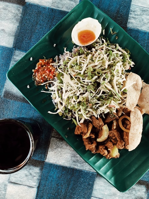 A beautifully arranged plate of prepared meals.
