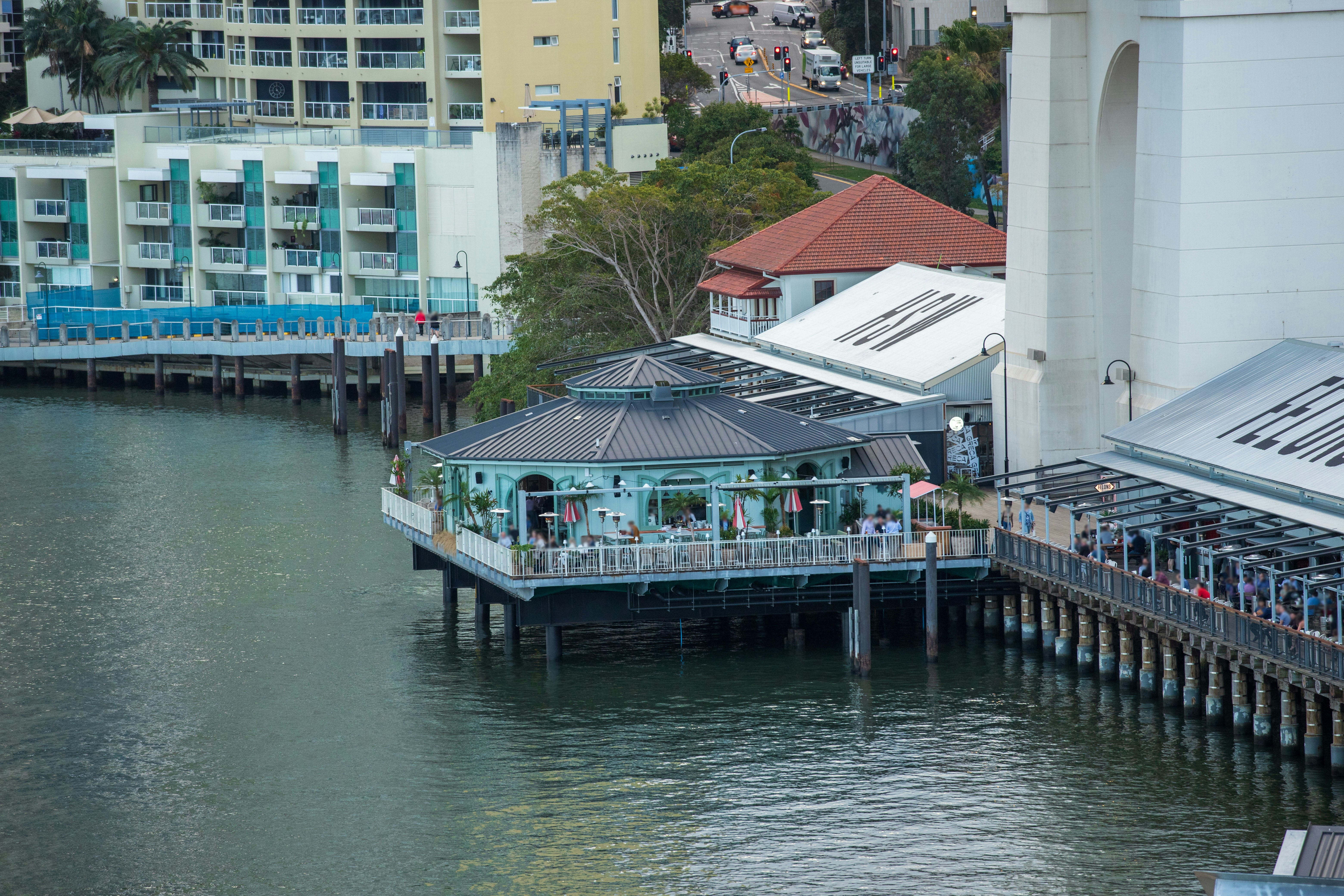green and blue wooden floating house