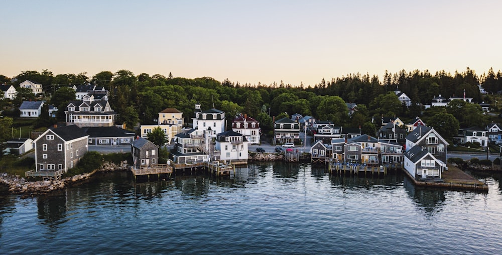 photography of buildings beside seashore during daytime