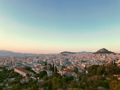 A panoramic shot of Bangalore's skyline at dusk, symbolizing Amith's home and work base.