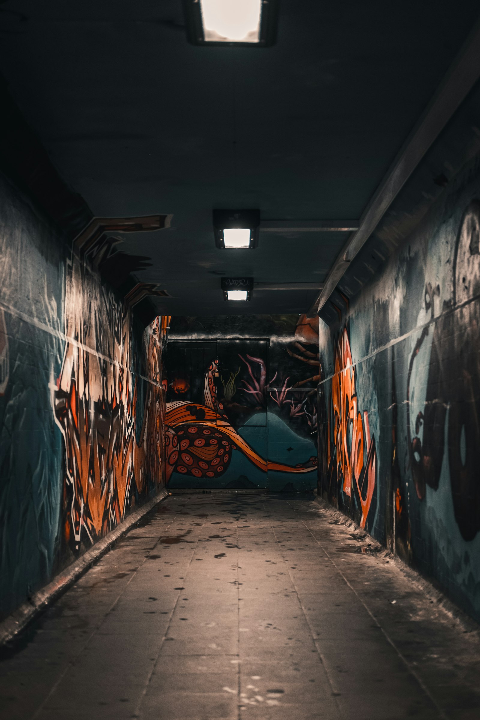 Fujifilm X-T3 + Fujifilm XF 35mm F2 R WR sample photo. Orange and black grafiti photography