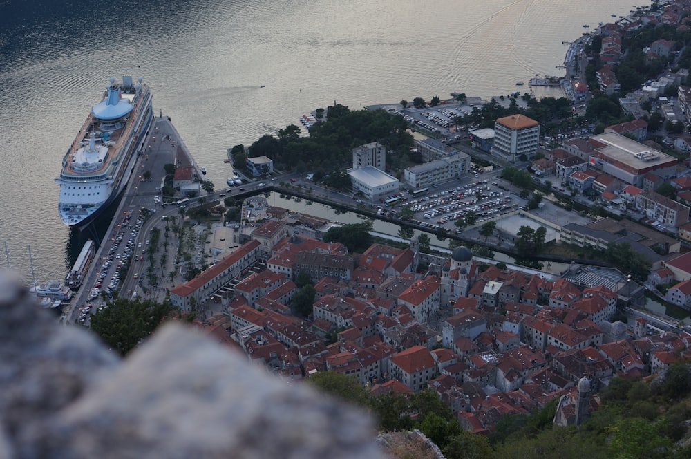 aerial photography of buildings near body of water