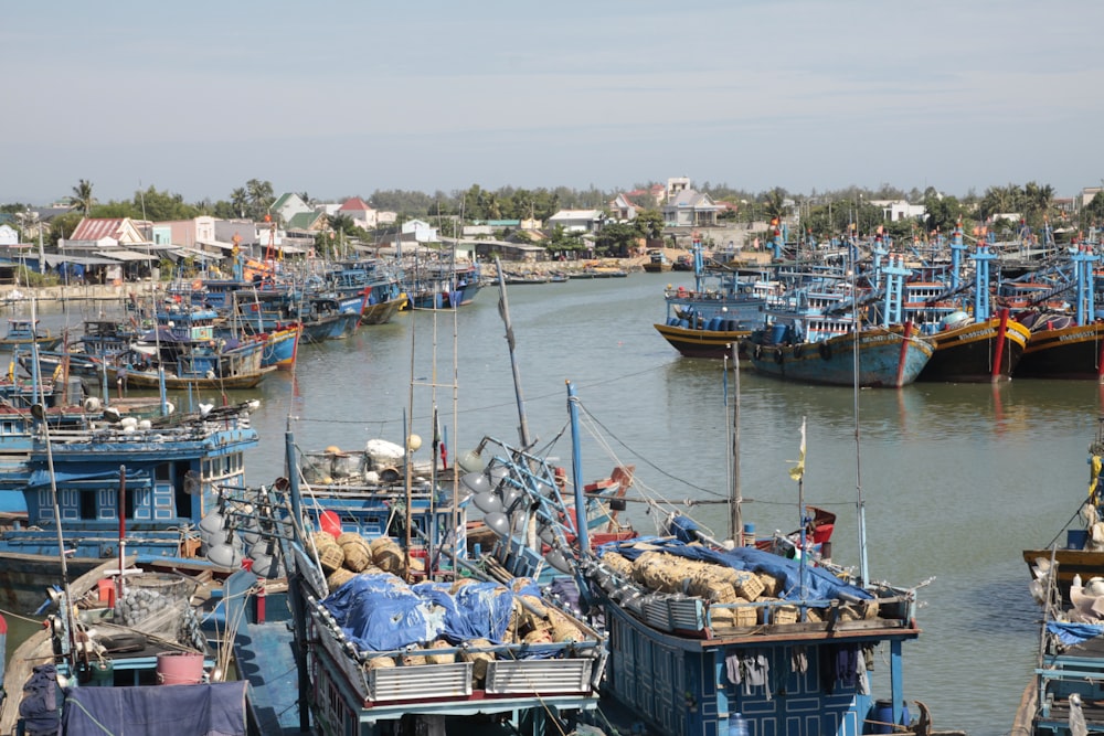 boats docked on water at daytime