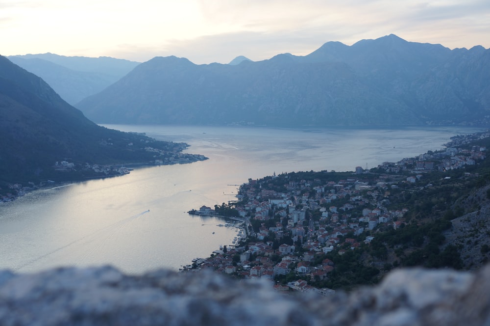 landscape photo of river in between mountains