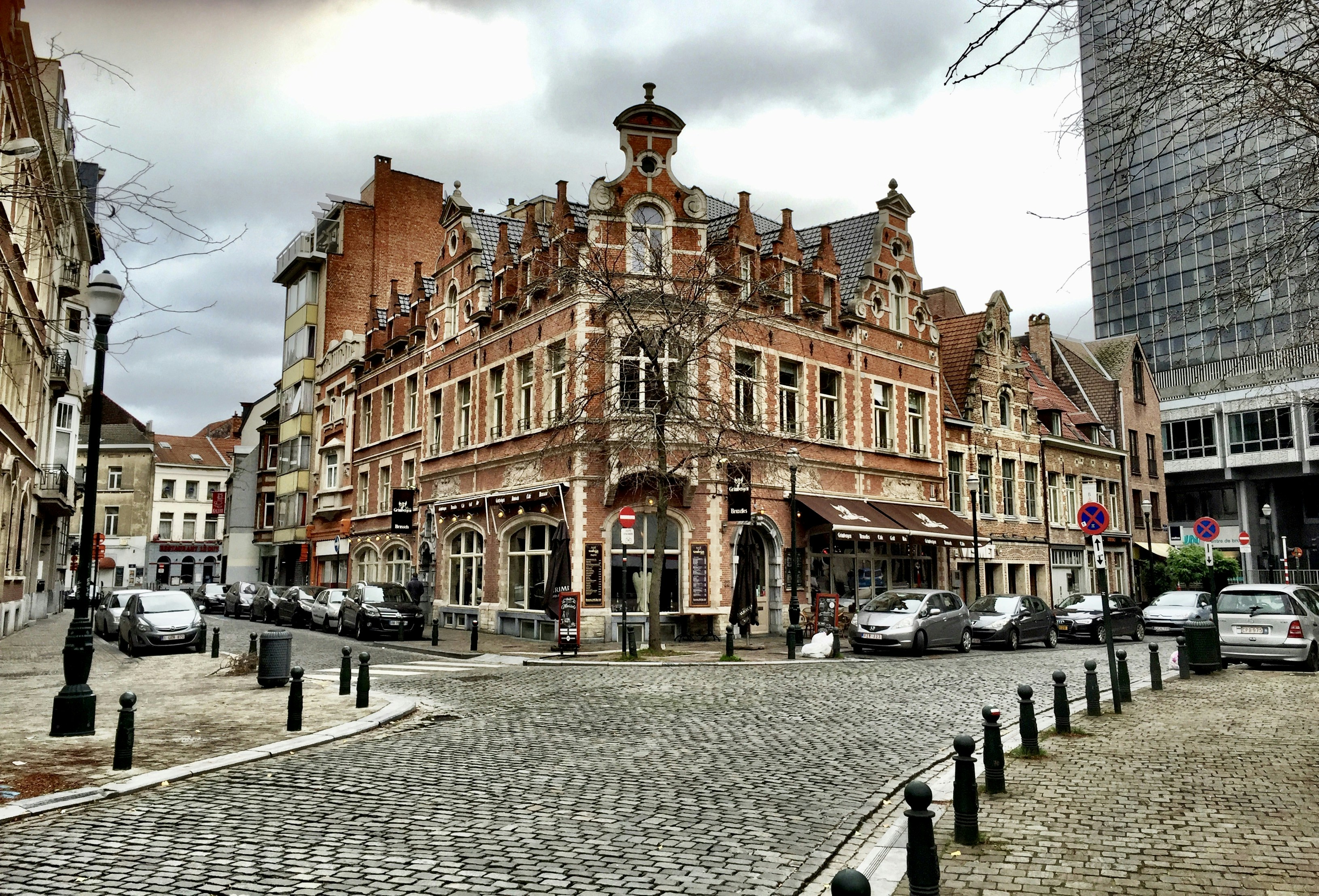 brown bulding, Beautiful and old building built with exposed brick at Place Sainte-Catherine at Brussels (Belgium).