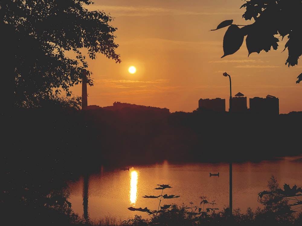 silhouette of buildings during golden hour