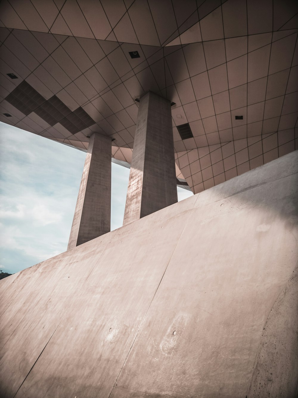 a skateboarder is doing a trick on a ramp