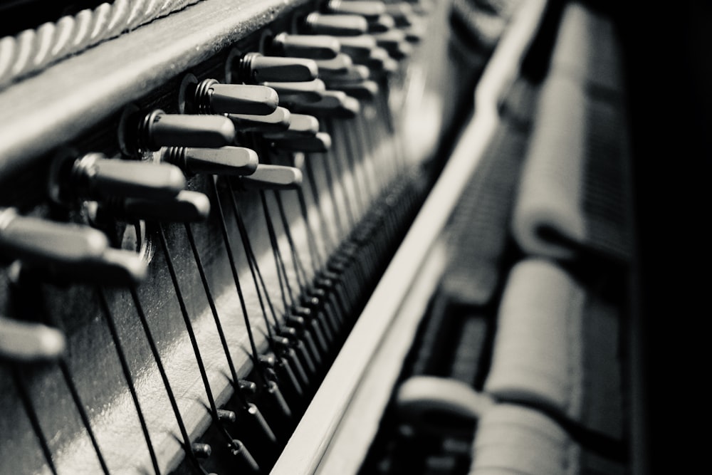 grayscale photography of piano