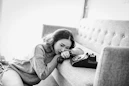 woman sitting near the osfa