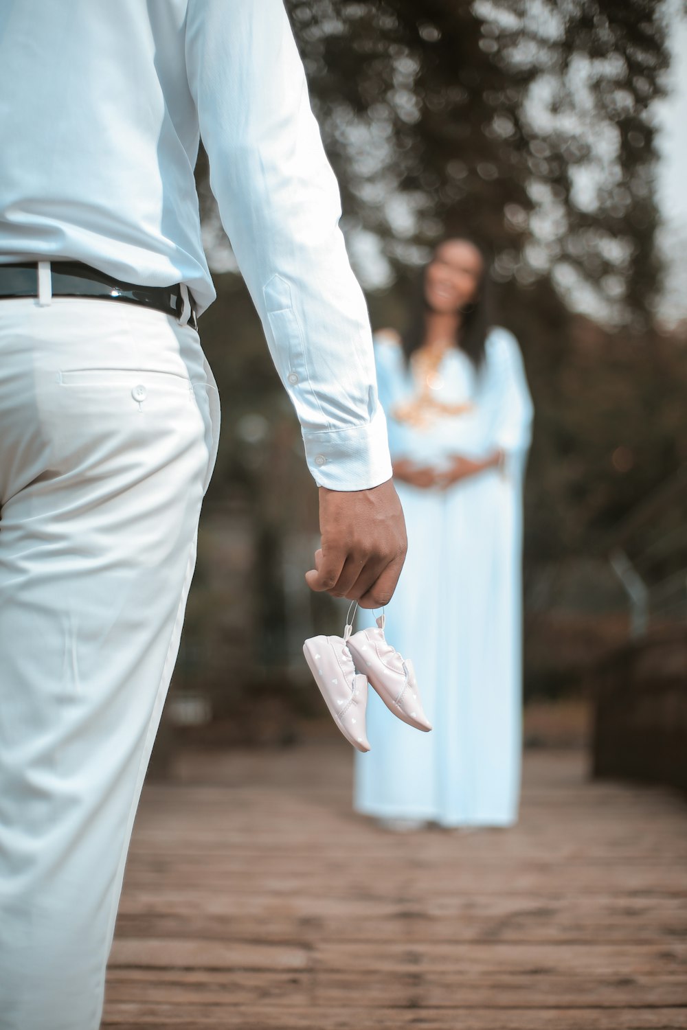 man wearing white pants