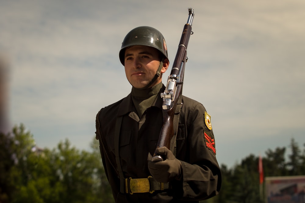 man holding rifle