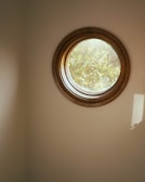 Newly fitted window with precise trim work showcasing natural light in a cozy room.