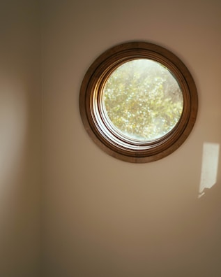 Newly fitted window with precise trim work showcasing natural light in a cozy room.