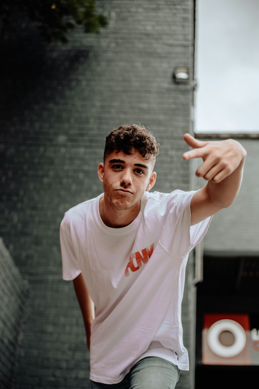 man wearing white crew-neck shirt