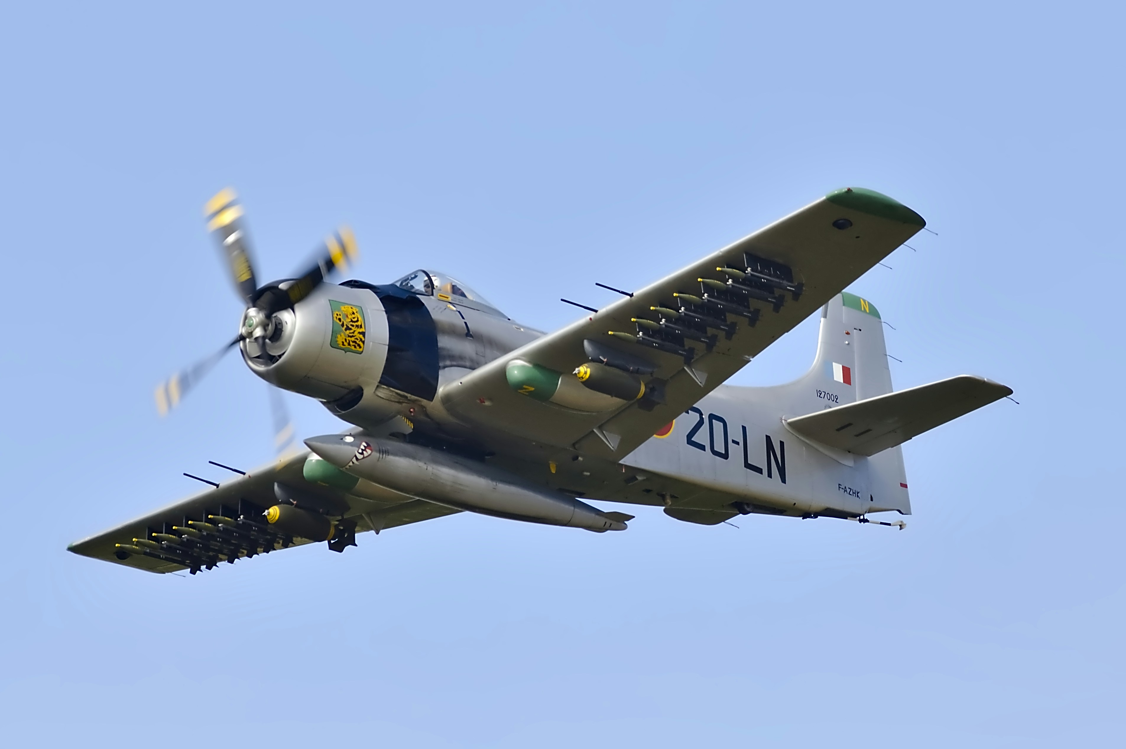 gray and blue airplane in mid air, AD-4N Skyraider