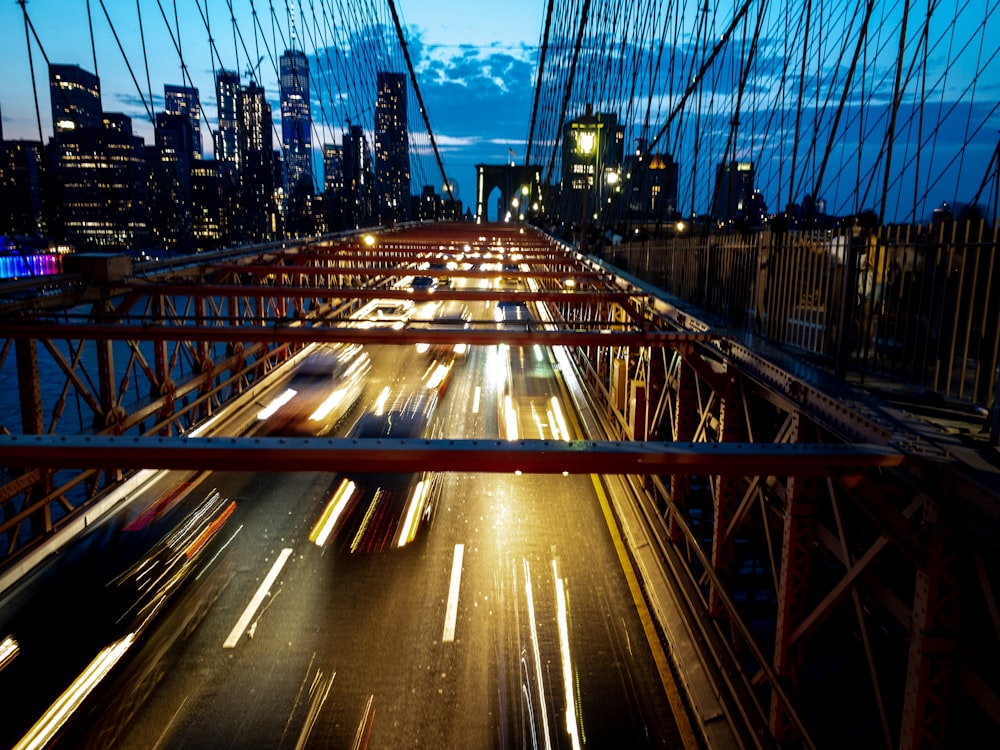 time lapse photography of cars on bridge