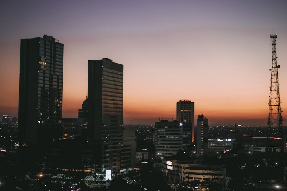 city with high-rise buildings during night time