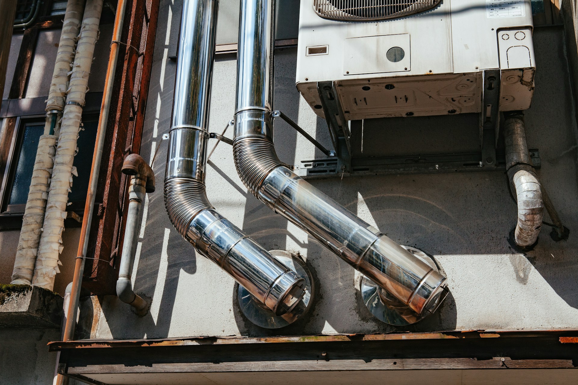 white outdoor AC unit