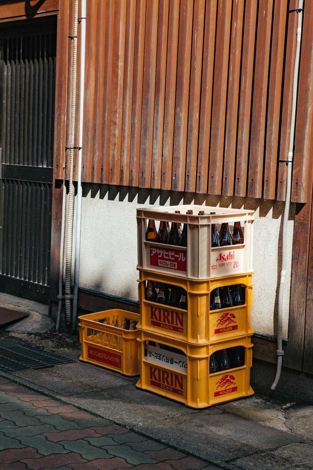 four plastic bottle crates